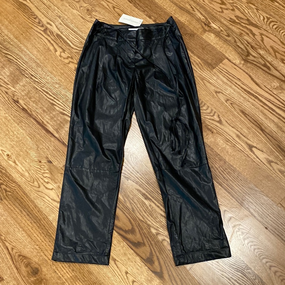 Womens faux leather high waisted straight leg pant with zip front and tie belt